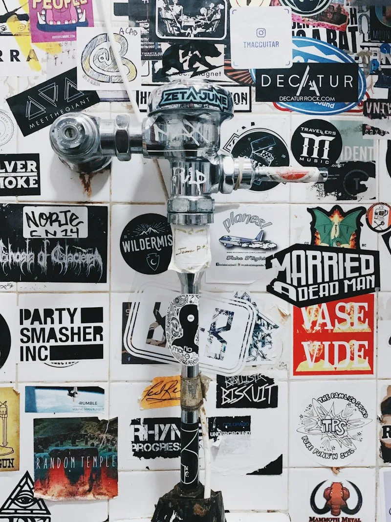 Wall plastered with band stickers