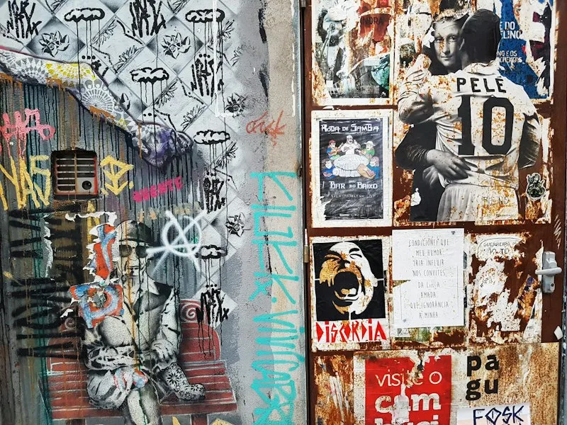 Wall layered with torn posters and graffiti